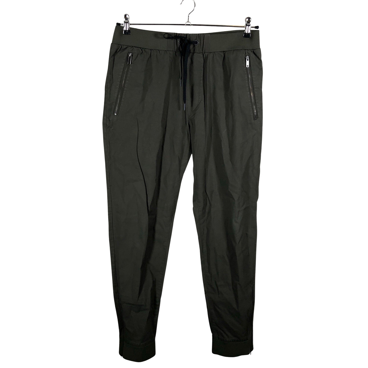 Unisex COS - Mittevenivad püksid, suurus M - Roheline (1)