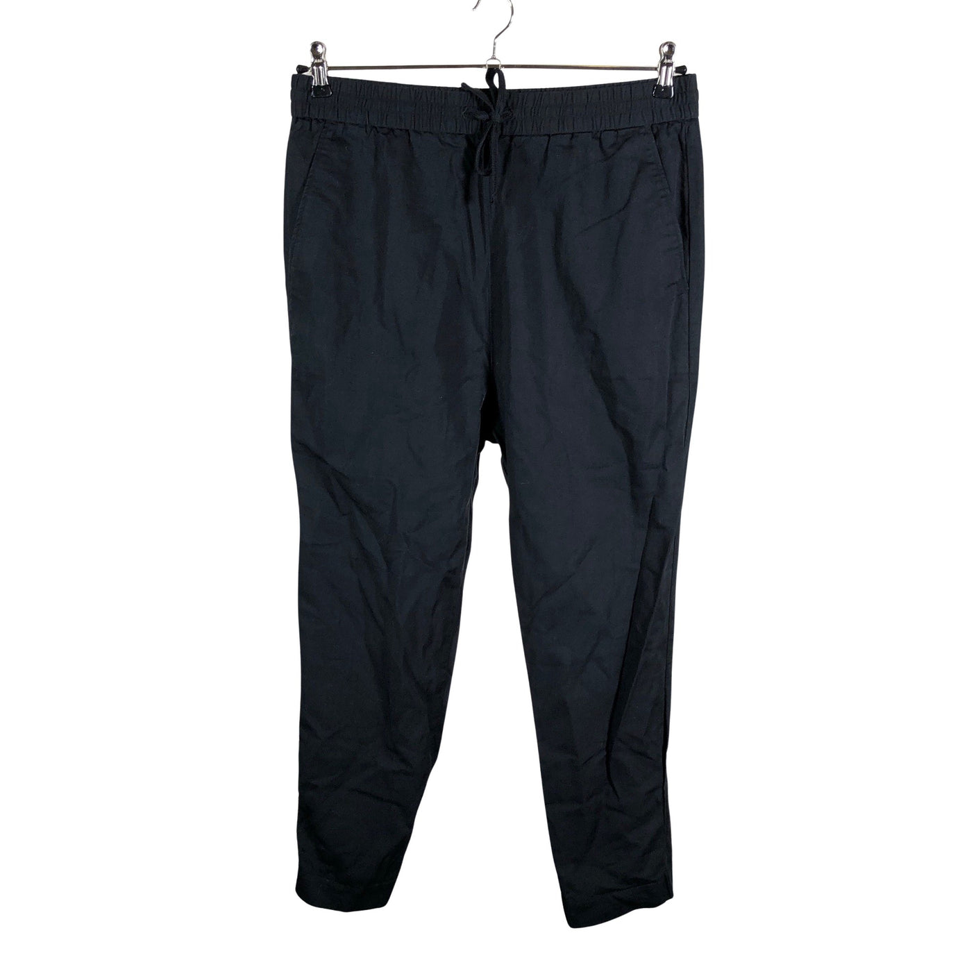 Unisex COS - Mittevenivad püksid, suurus 40 - Must (1)