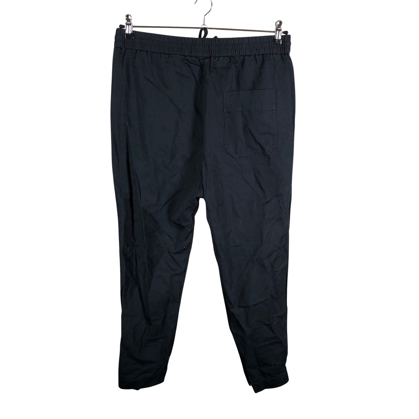 Unisex COS - Mittevenivad püksid, suurus 40 - Must (2)