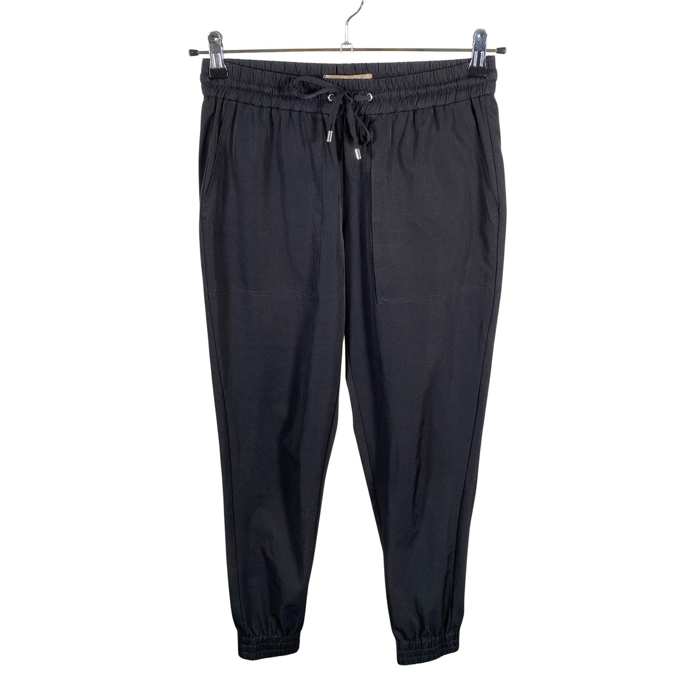 Unisex Noom - Mittevenivad püksid, suurus 34 - Must (1)