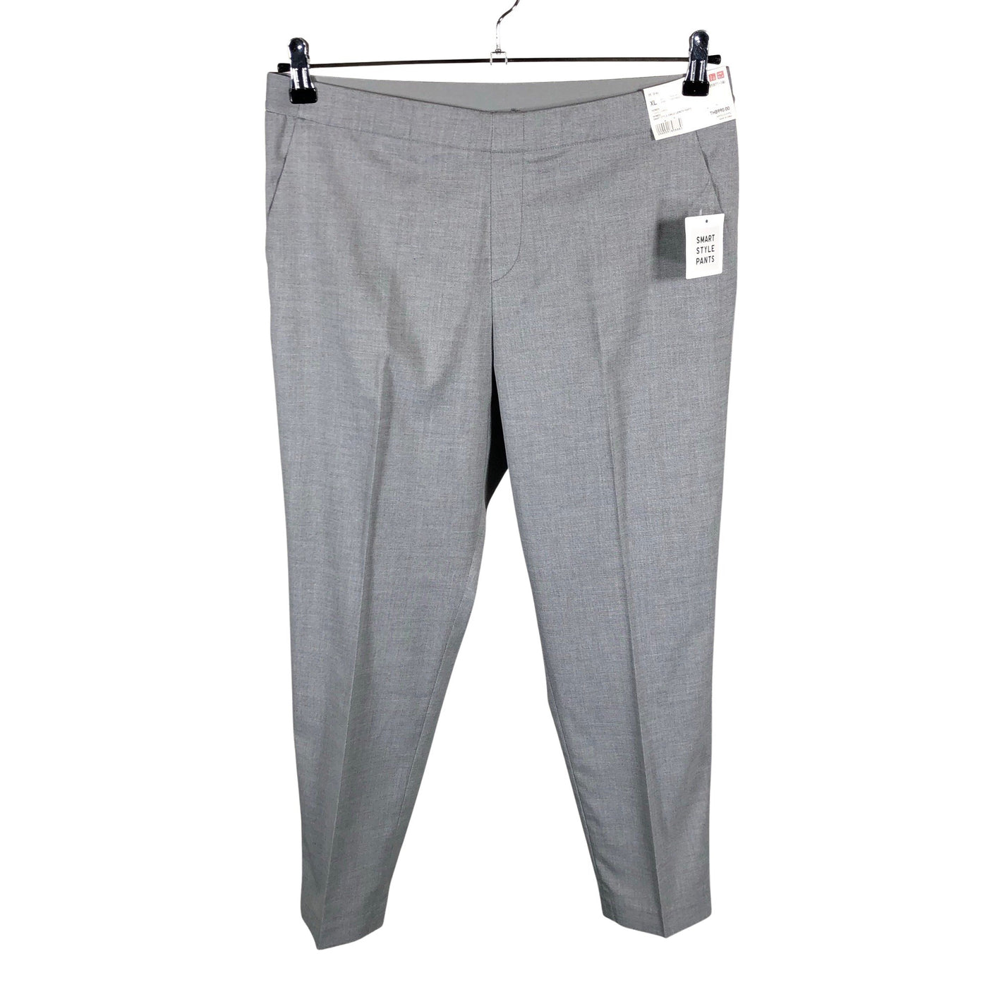 Unisex Uniqlo - Mittevenivad püksid, suurus 42 - Hall (1)