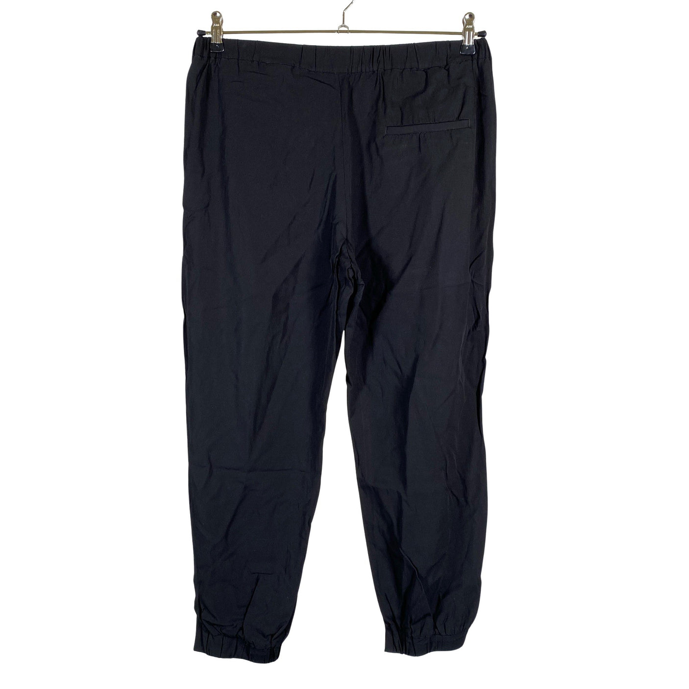 Unisex COS - Mittevenivad püksid, suurus 38 - Must (2)