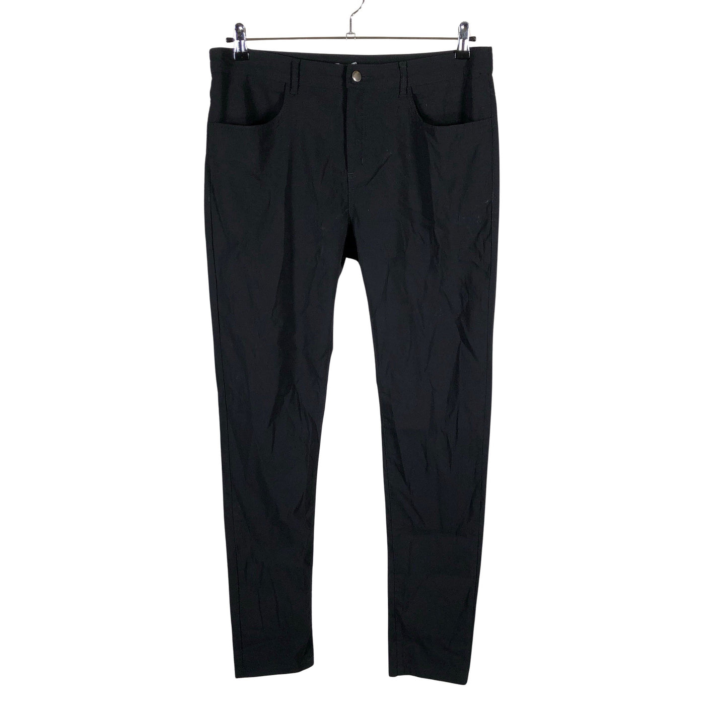 Unisex O.I.S - Mittevenivad püksid, suurus 46 - Must (1)