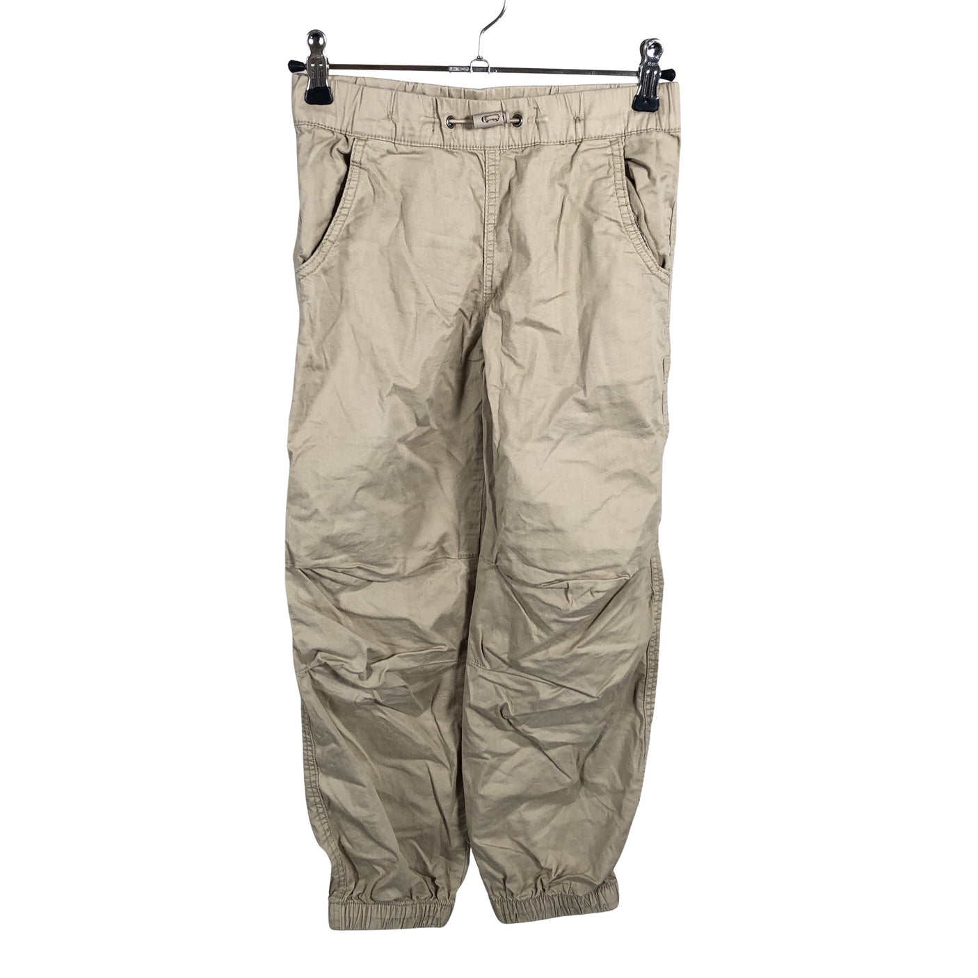 Unisex Lindex - Mittevenivad püksid, suurus 128 - 134 - Beige (1)