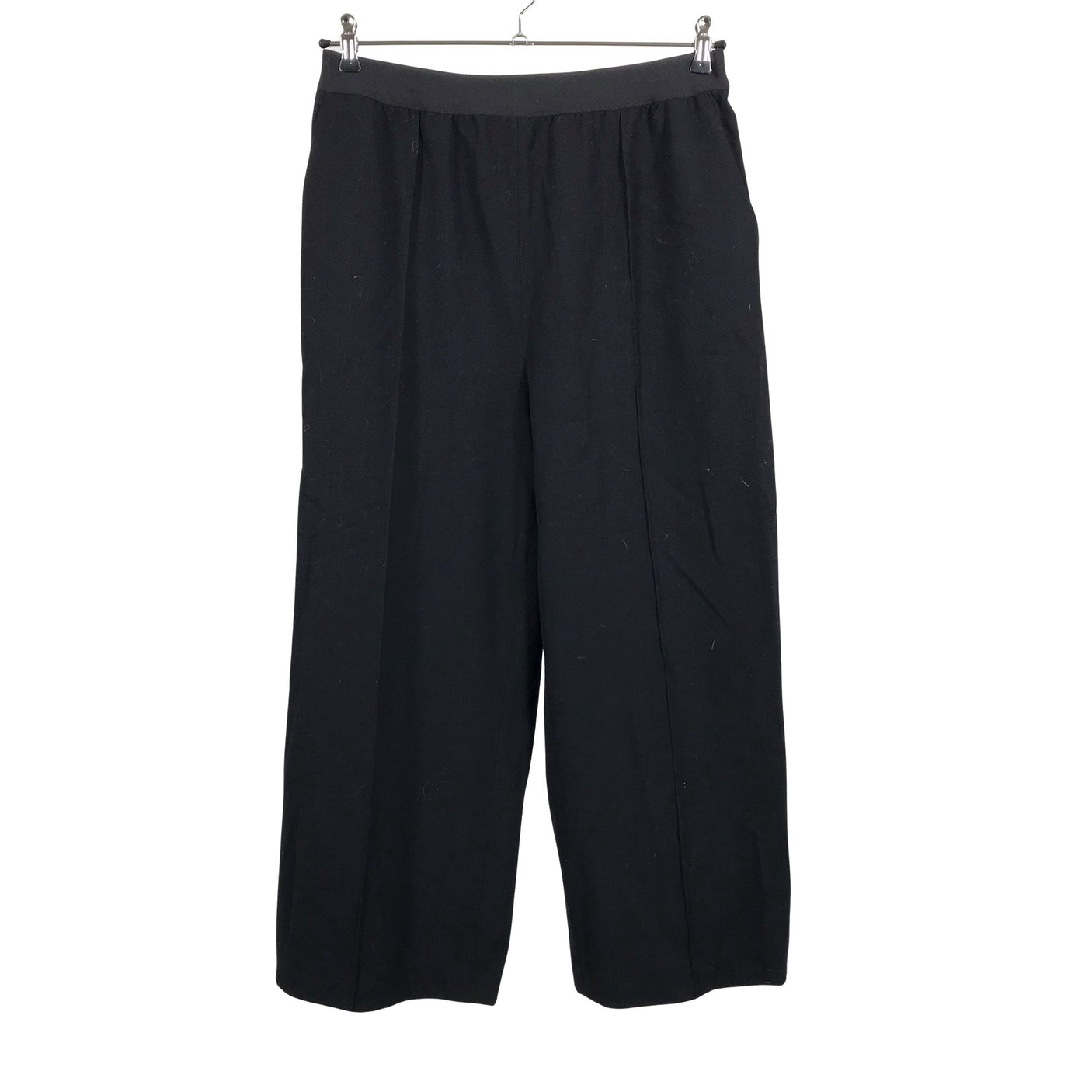 Unisex Arket - Mittevenivad püksid, suurus 42 - Must (1)