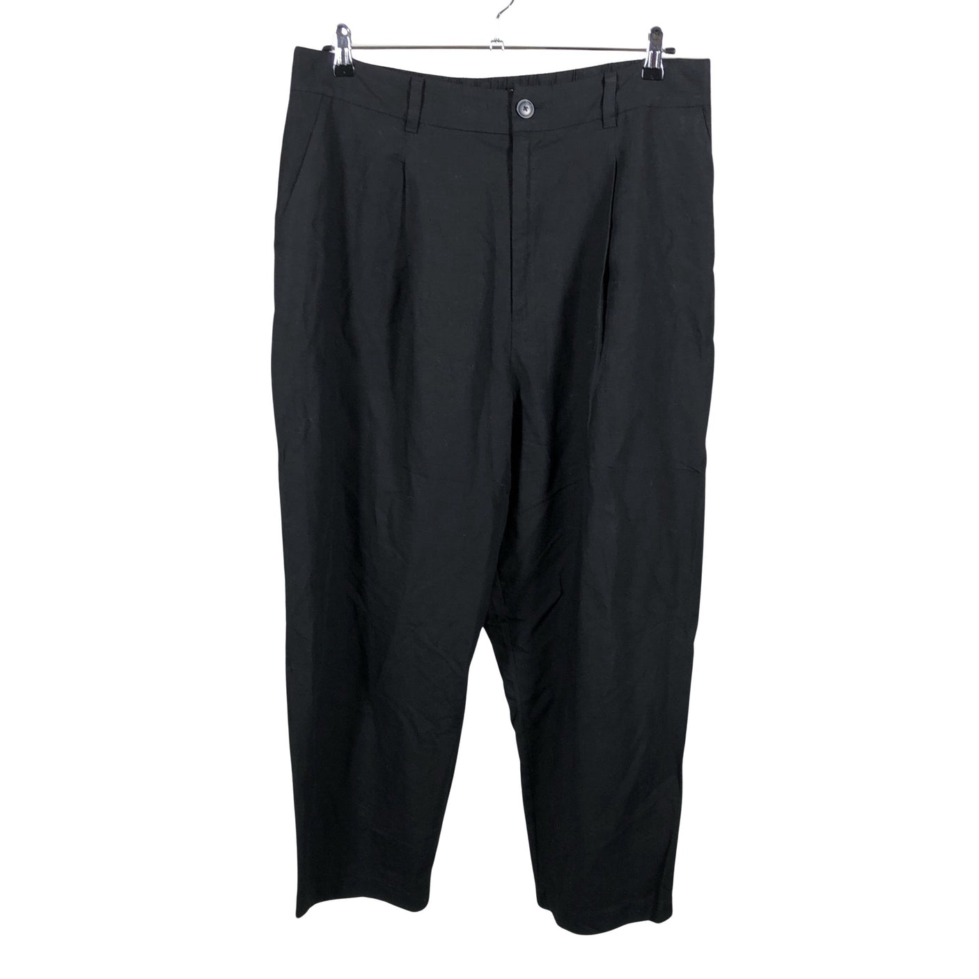 Unisex Uniqlo - Mittevenivad püksid, suurus 44 - Must (1)