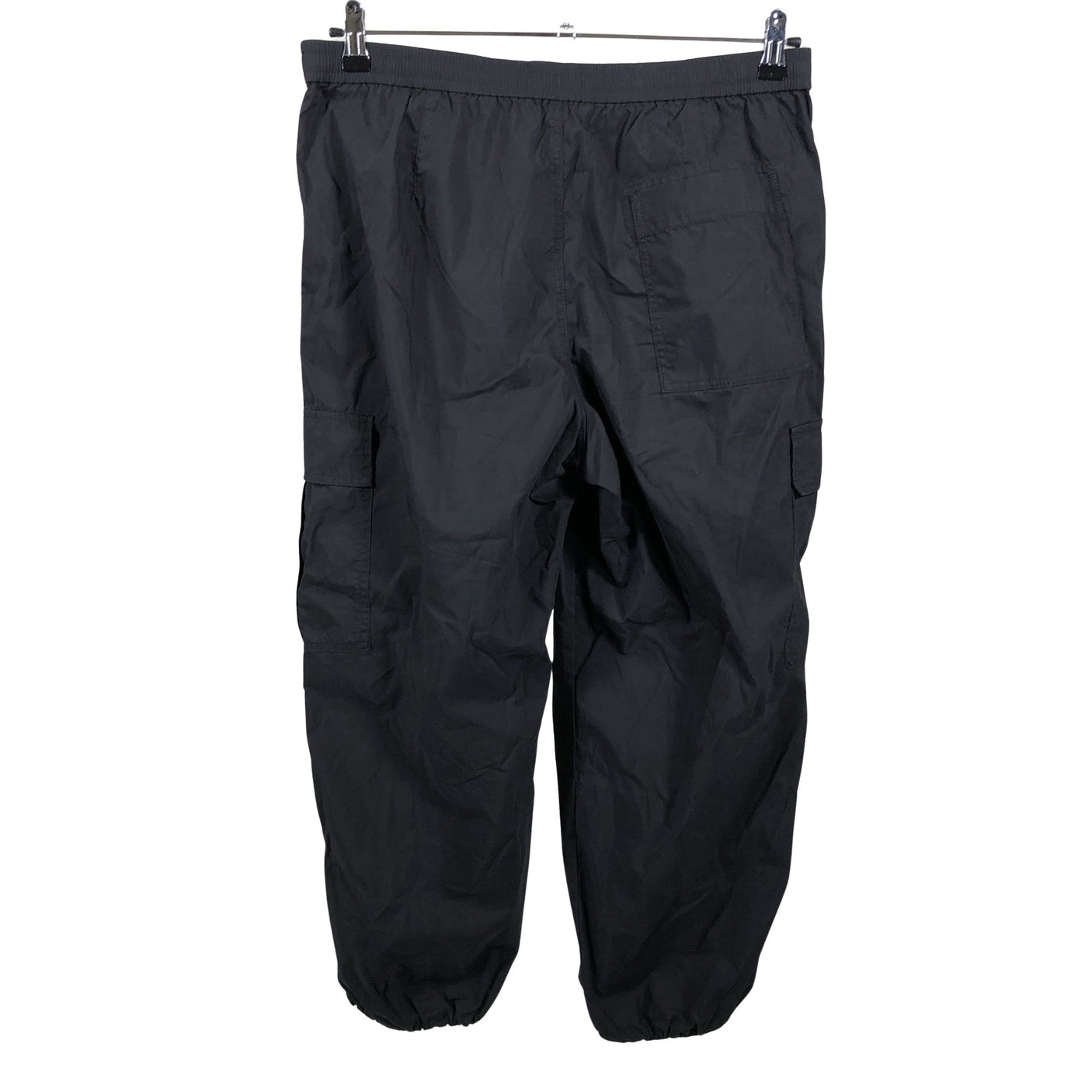 Unisex Uniqlo - Mittevenivad püksid, suurus 42 - Must (2)
