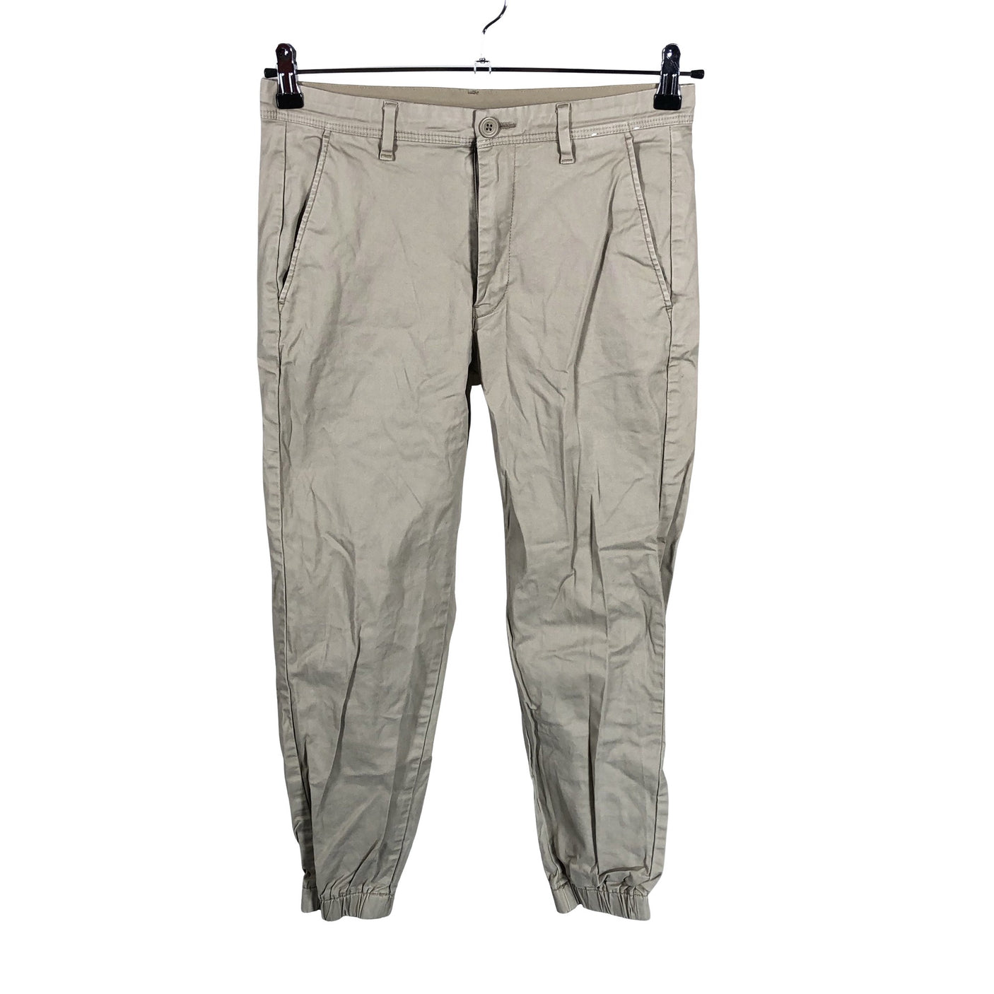 Unisex Uniqlo - Mittevenivad püksid, suurus 36 - Pruun (1)
