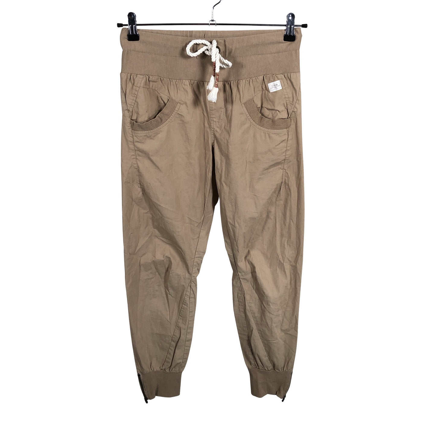 Unisex Torstai - Mittevenivad püksid, suurus 36 - Beige (1)