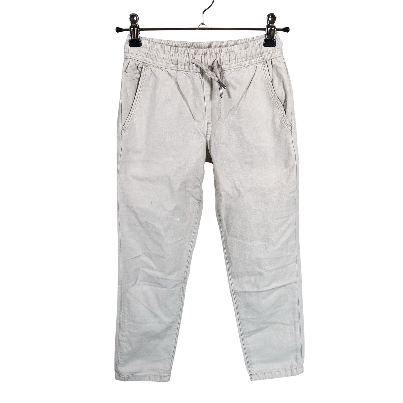 Unisex We - Mittevenivad püksid, suurus 128 - 134 - Beige (1)