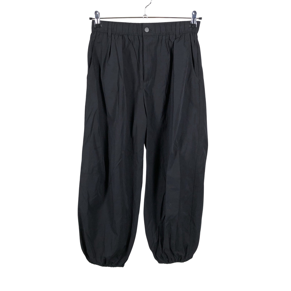 Unisex Gu - Mittevenivad püksid, suurus 40 - Must (1)