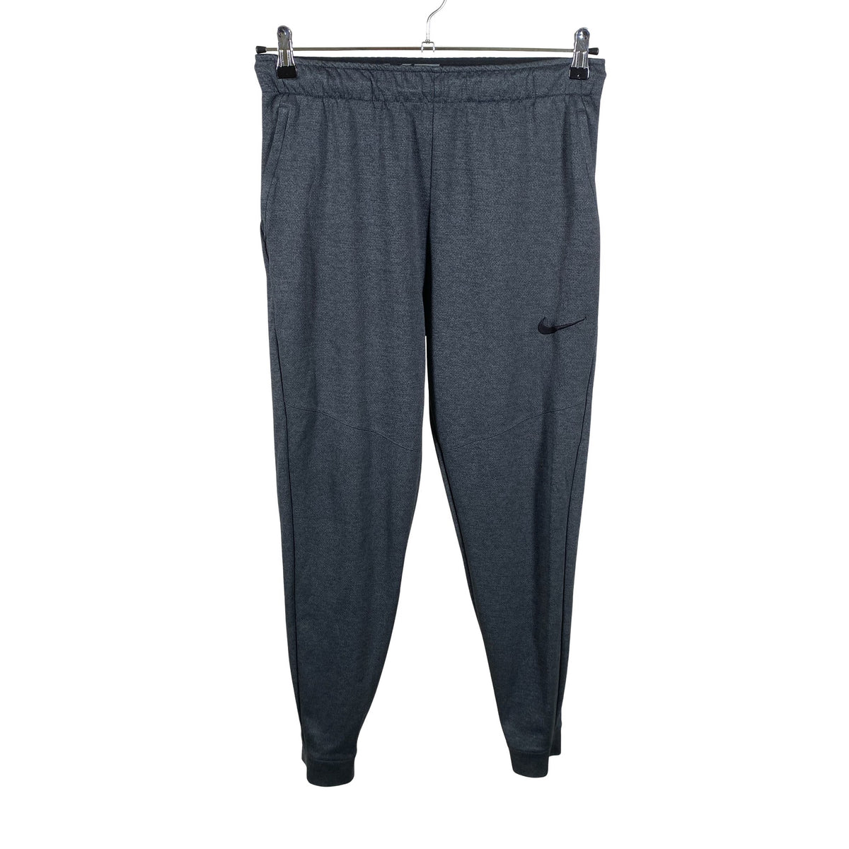 Unisex Nike - Soojenduspüksid, suurus M - Hall (1)