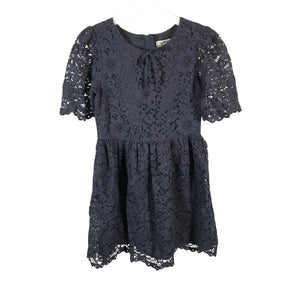 Unisex Next - Kangasmekko, koko 128 - 134 -  (1)