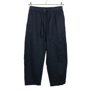 Unisex COS - Mittevenivad püksid, suurus 38 - Sinine (1)