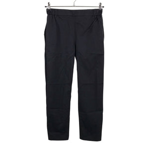 Unisex COS - Mittevenivad püksid, suurus 36 - Must (1)