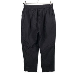 Unisex R-collection - Mittevenivad püksid, suurus 42 - Must (2)