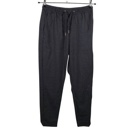 Unisex Holly & Whyte by Lindex - Mittevenivad püksid, suurus 34 - Hall ()