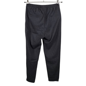 Unisex Holly & Whyte by Lindex - Mittevenivad püksid, suurus 34 - Hall (2)