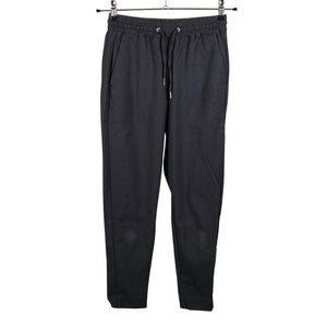 Unisex Holly & Whyte by Lindex - Mittevenivad püksid, suurus 34 - Hall (1)