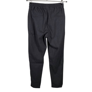 Unisex Holly & Whyte by Lindex - Mittevenivad püksid, suurus 34 - Hall (2)