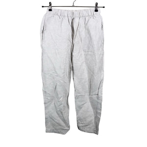 Unisex Oysho - Mittevenivad püksid, suurus 36 - Beige (1)
