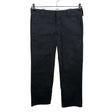 Unisex Dickies - Mittevenivad püksid, suurus W29 - Must ()