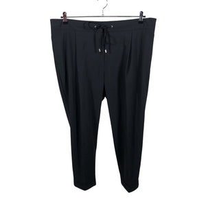 Unisex Marks&Spencer - Mittevenivad püksid, suurus 48 - Must (1)