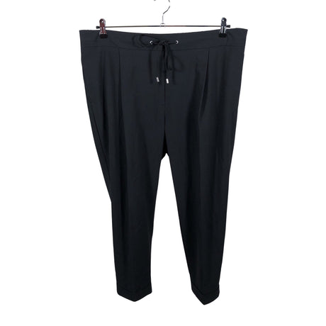 Unisex Marks&Spencer - Mittevenivad püksid, suurus 48 - Must ()