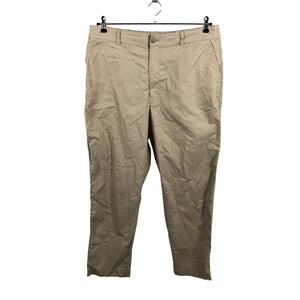 Unisex Uniqlo - Mittevenivad püksid, suurus 46 - Beige (1)