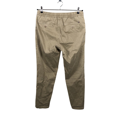 Unisex Tommy Hilfiger - Mittevenivad püksid, suurus M - Pruun (2)