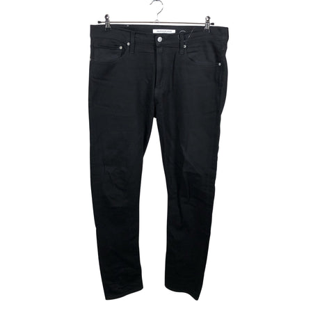 Unisex Calvin Klein Jeans - Teksad, suurus W36 - Must ()