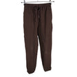 Unisex Meshki - Dressikangast püksid, suurus 36 - Pruun ()