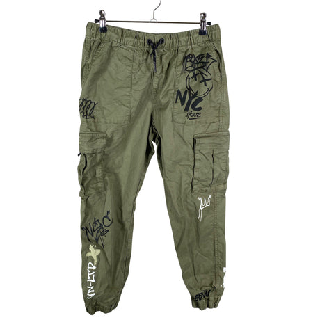 Unisex Next - Mittevenivad püksid, suurus 146 - 152 - Roheline ()