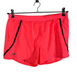 Unisex Under Armour - Lühikesed spordipüksid, suurus 38 - Oranž ()