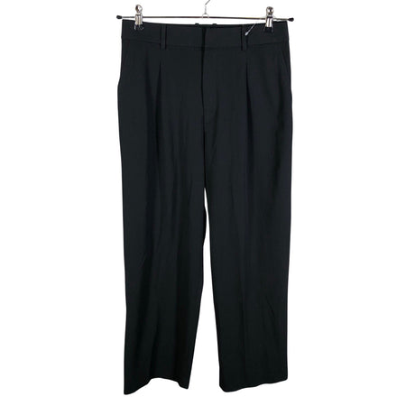 Unisex Uniqlo - Mittevenivad püksid, suurus 38 - Must ()