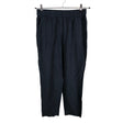 Unisex Second Female - Mittevenivad püksid, suurus 38 - Must ()