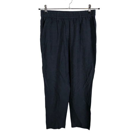 Unisex Second Female - Mittevenivad püksid, suurus 38 - Must ()