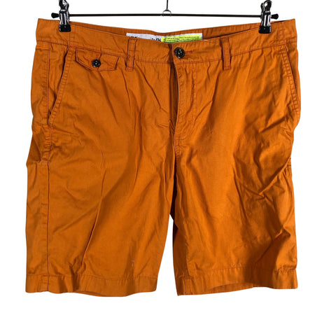 Unisex Helly Hansen - Lühikesed püksid, suurus W34 - Oranž ()