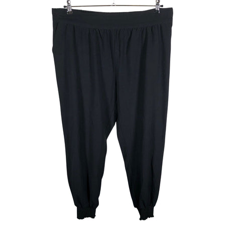 Unisex Cream - Mittevenivad püksid, suurus 46 - Must ()