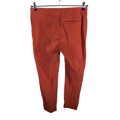Unisex COS - Mittevenivad püksid, suurus 42 - Oranž (2)