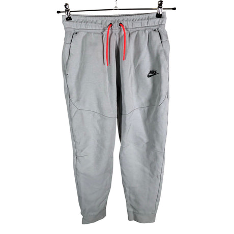 Unisex Nike - Dressikangast püksid, suurus 158 - 164 - Hall ()