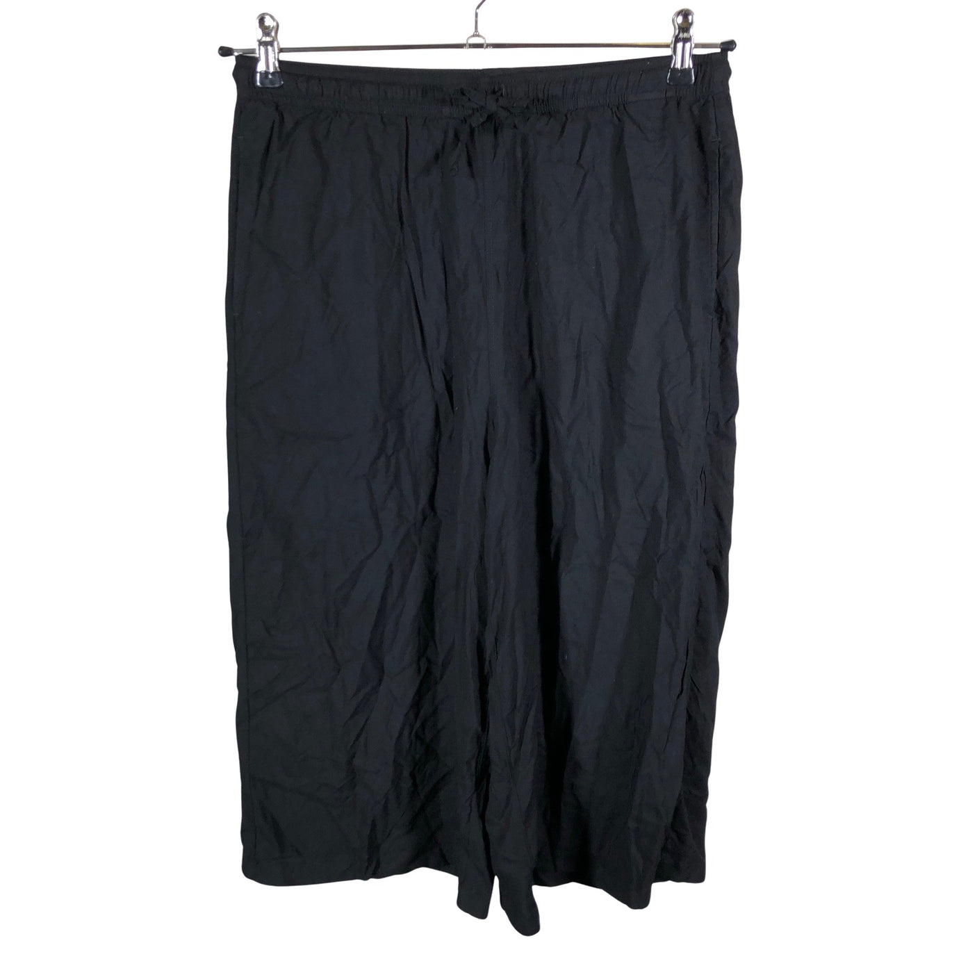 Unisex Uniqlo - Mittevenivad poolpikad püksid, suurus 38 - Must (1)