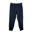 Unisex COS - Mittevenivad püksid, suurus 38 - Sinine ()