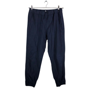 Unisex COS - Mittevenivad püksid, suurus 38 - Sinine (1)