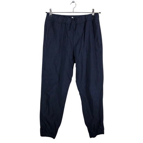 Unisex COS - Mittevenivad püksid, suurus 38 - Sinine ()