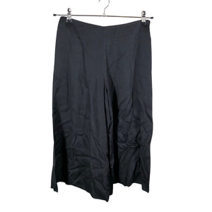 Unisex COS - Mittevenivad püksid, suurus 34 - Must (1)