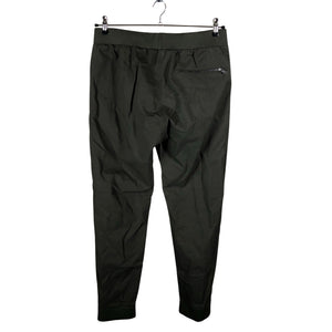Unisex COS - Mittevenivad püksid, suurus M - Roheline (2)
