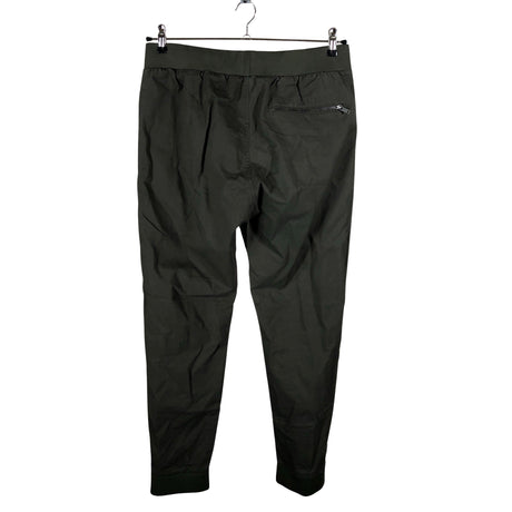 Unisex COS - Mittevenivad püksid, suurus M - Roheline (2)