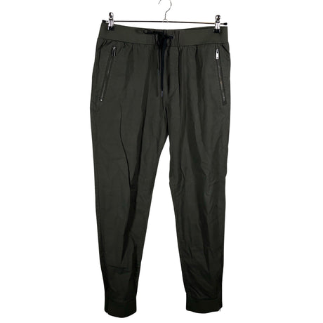 Unisex COS - Mittevenivad püksid, suurus M - Roheline ()