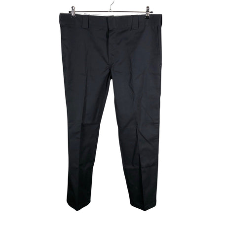 Unisex Dickies - Mittevenivad püksid, suurus W36 - Must ()